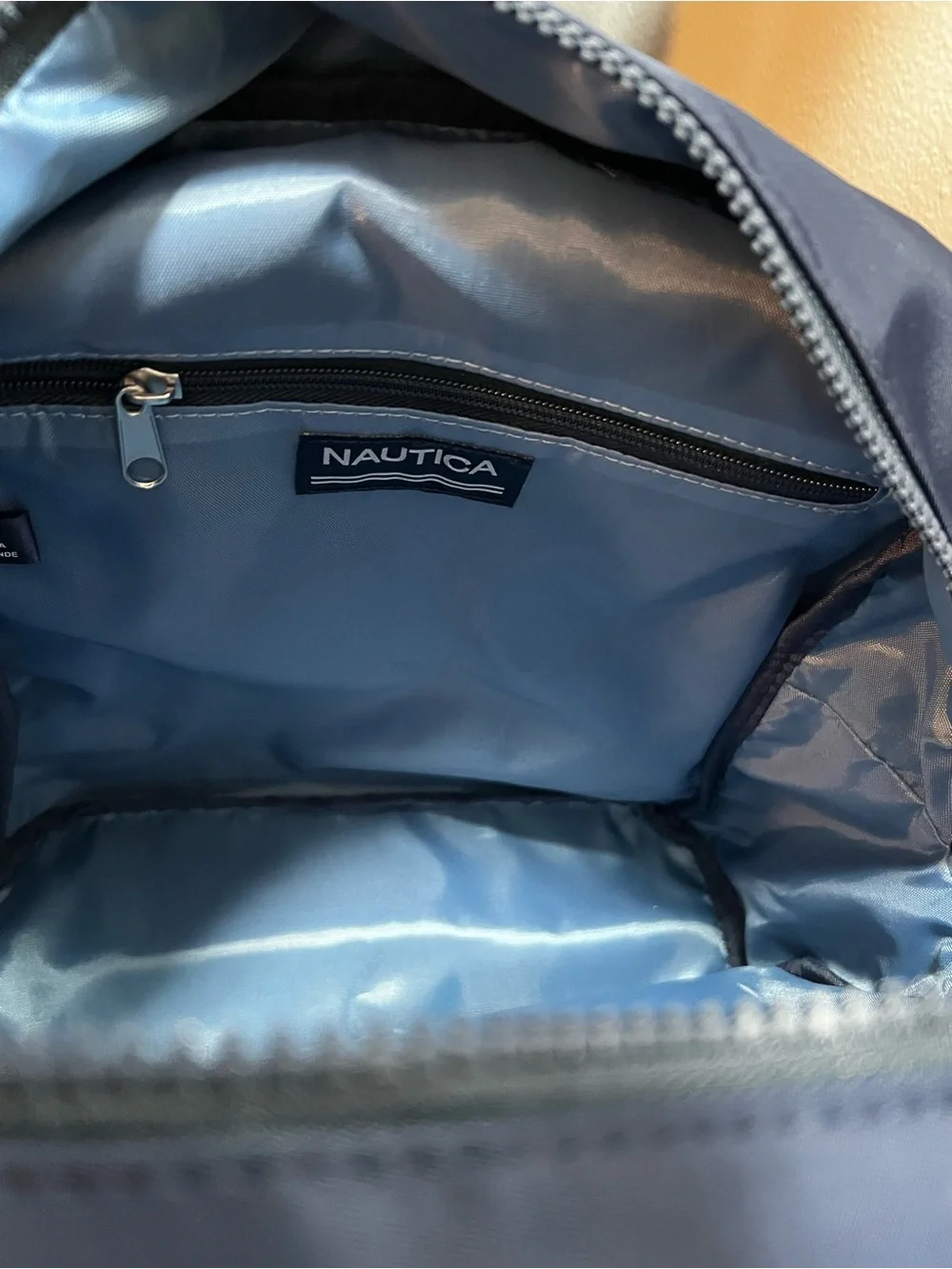 Nautica Navy Backpack with Red Logo Tag Accent